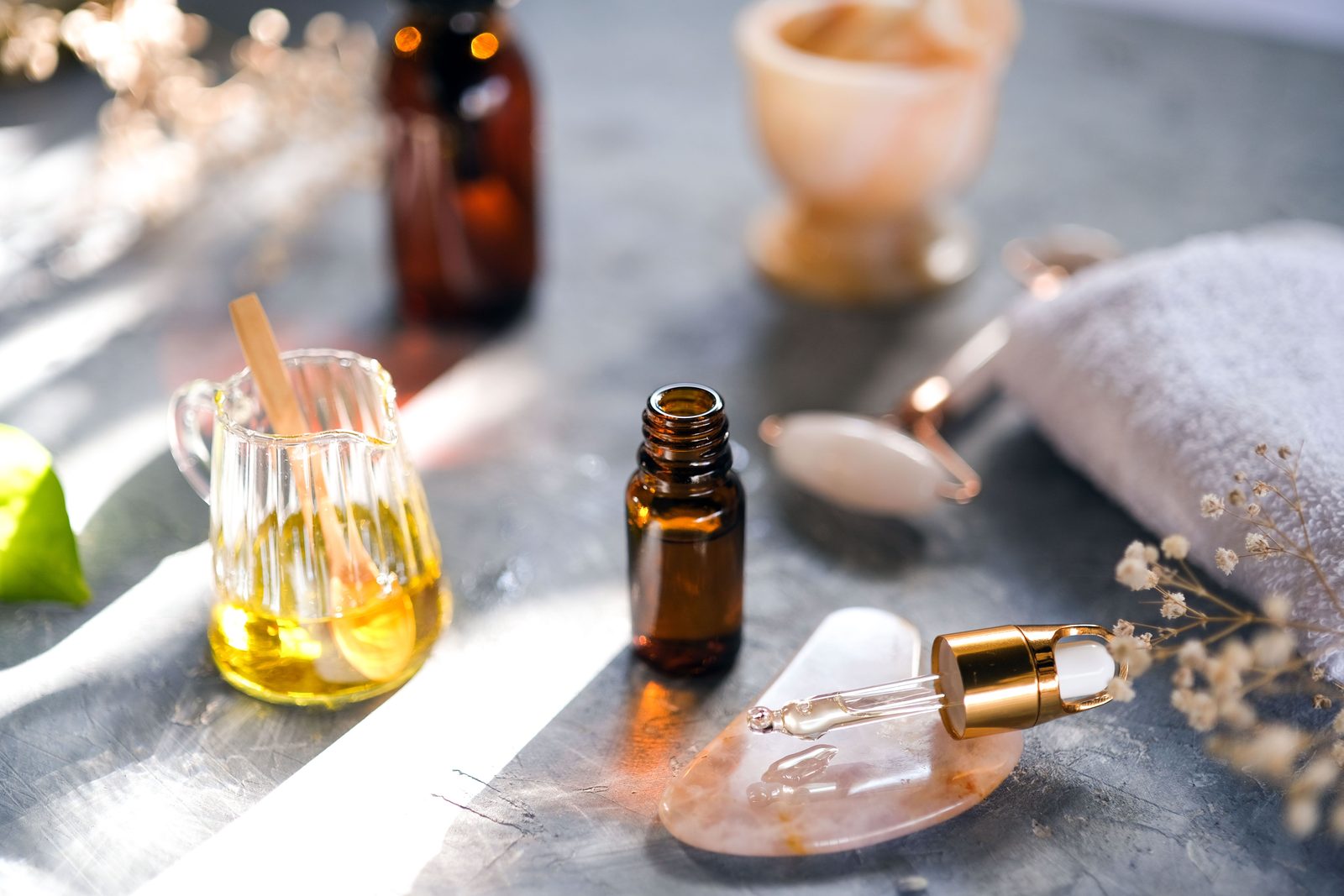 Botanical oil, dropper and skincare ritual objects